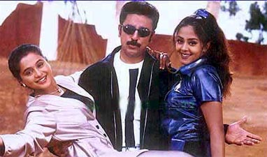 Kamal Haasan and Jyotika in Thenali