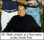 Dr. Shah, seated,
at a beer party in the Noth Pole