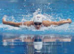 Inge de Bruijn on way to a new Olympic record. REUTERS/David Gray 