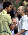 Kuerten and Agassi at the end of the ATP Masters Cup on December 3, 2000