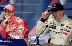 Michael Schumacher (L) and Mika Hakkinen.