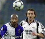 Porto soccer player Renivaldo Pena (L) heads the ball followed by Rosenborg's Odd Inge Olsen (R) 