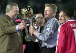 Bayern Munich's goalkeeper and captain Oliver Kahn receives the World Club Cup from UEFA President Lennart Johansson. 