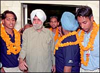 IHF president KPS Gill with the Indian hockey team