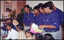 Sri Lankan team members with Bombay's street
kids