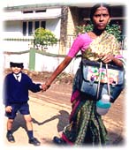 Child going to school with the maid